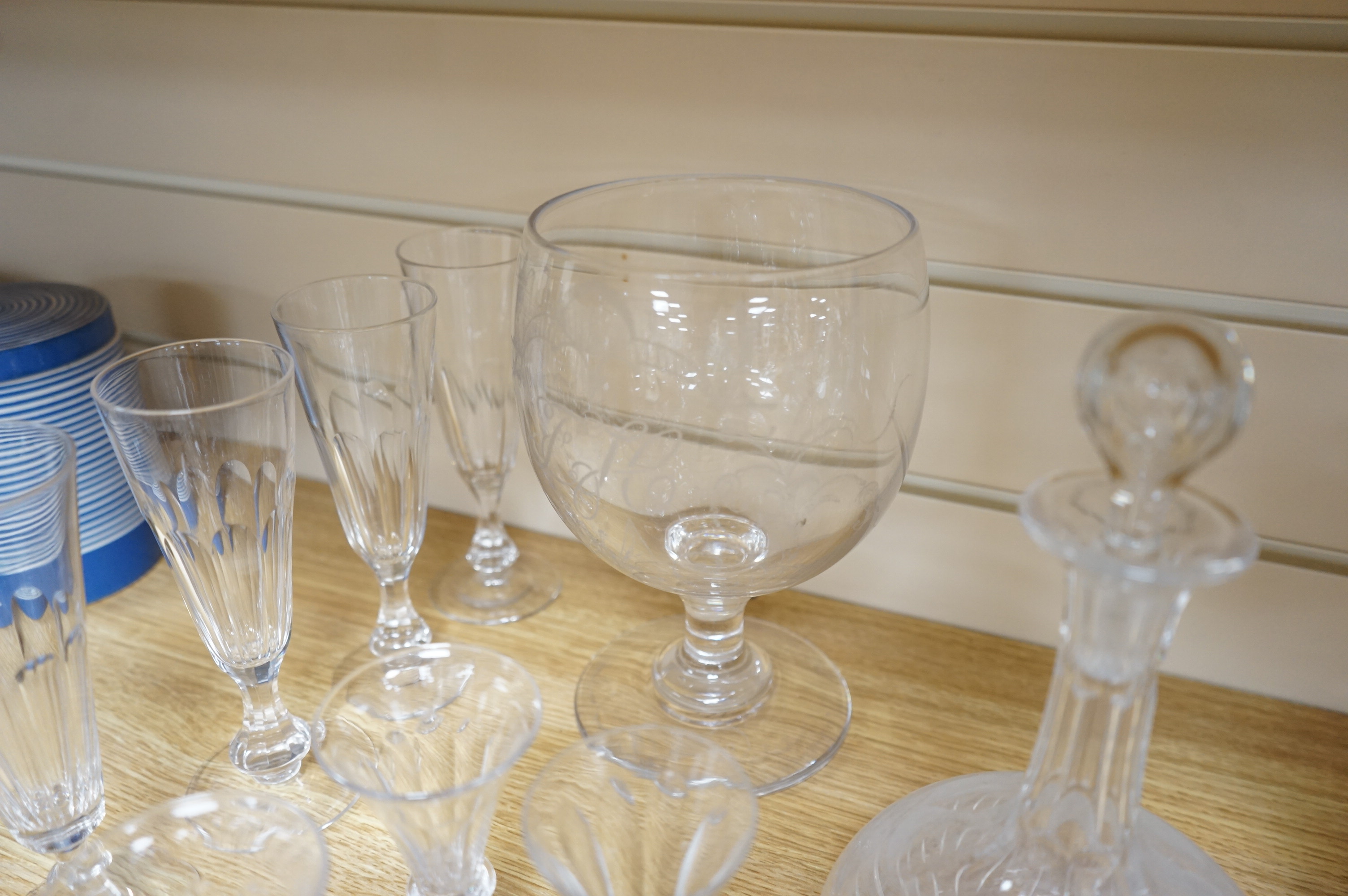 A collection of assorted drinking glassware including sets of decanters and a large etched glass goblet, largest 27cm high